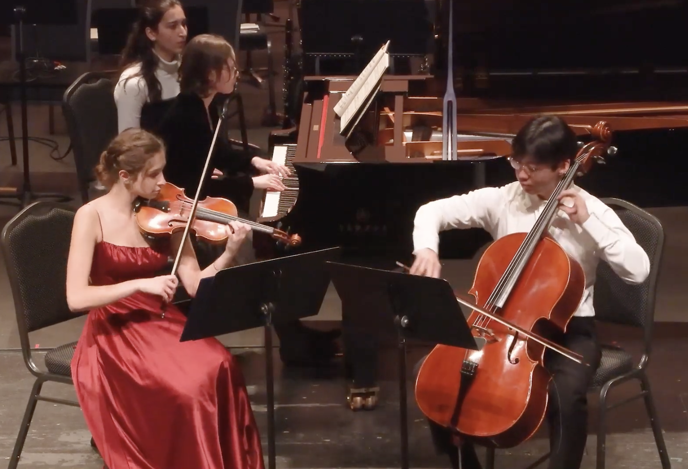 Violinist Frances Norton, Cellist David Kim, and Pianist Monet Jowers in performance